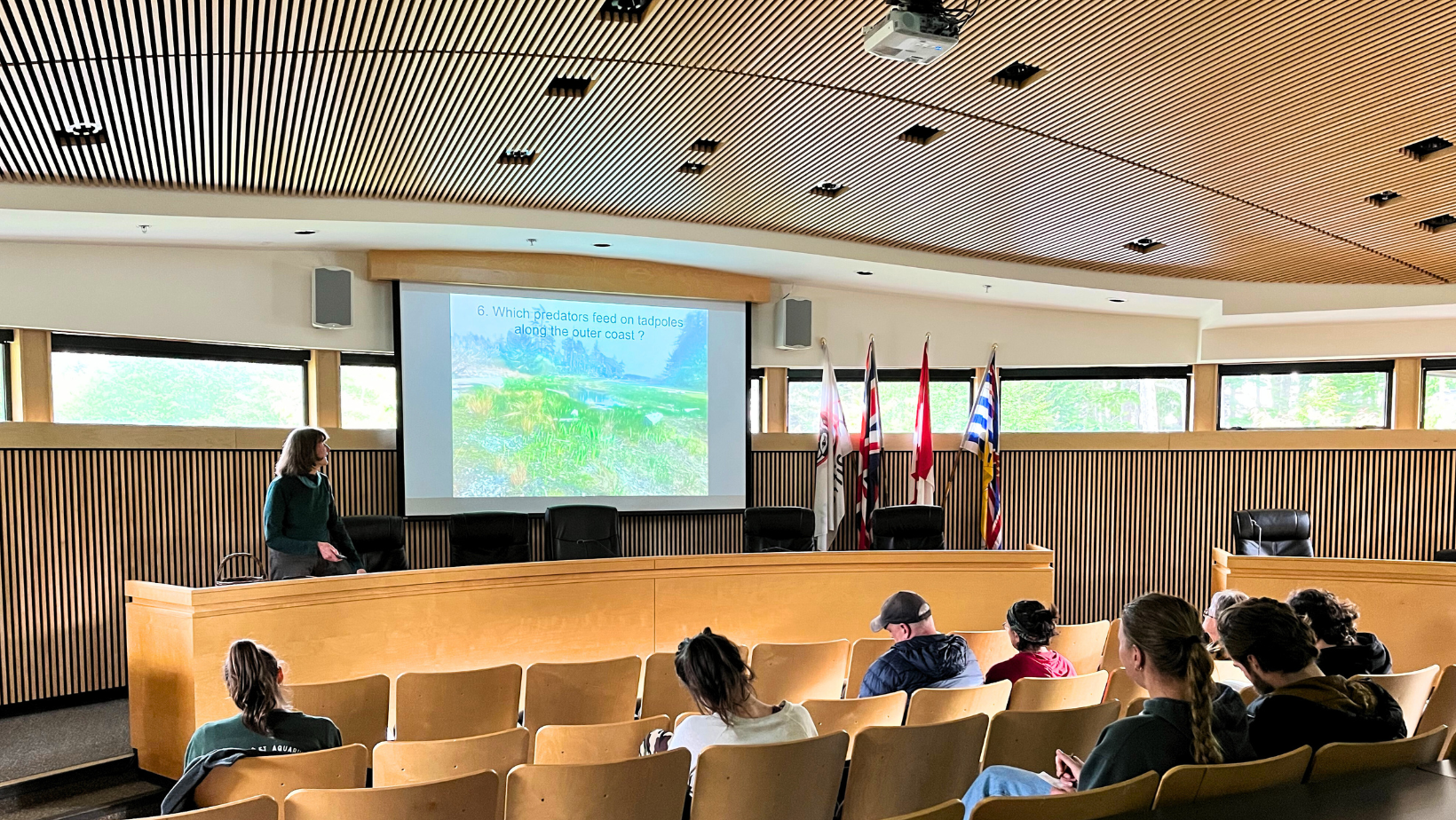Barb Beasly presenting on Some of the Coolest Biodiversity Ever: Frogs, Bogs, Salamanders and Salt Marshes to and audience
